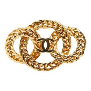 CHANEL Gold Logo Brooch